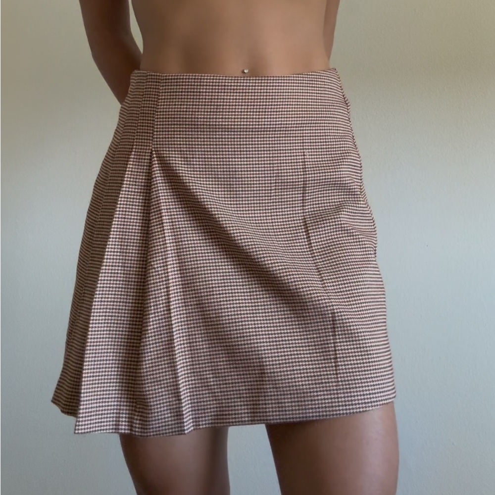 Asymmetrical pleated skirt